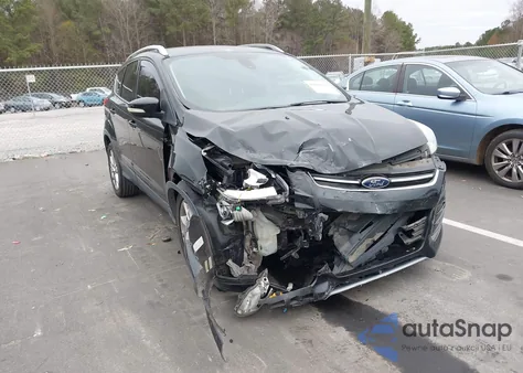 2016 Ford Escape Titanium z USA, uszkodzony, nr VIN 1FMCU0JX6GUB79270